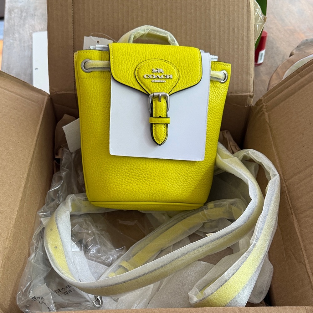 COACH Amelia Yellow and White Pebbled Leather Mini Bucket Crossbody - Picture 3 of 3